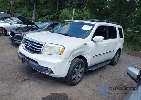 2012 Honda Pilot Touring z USA, uszkodzony, nr VIN 5FNYF4H91CB027872